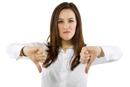 Woman with thumbs pointing down